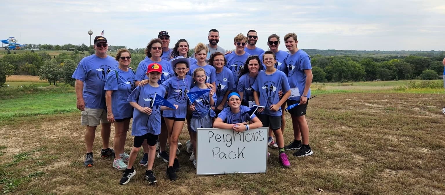 Peighton's Pack, the ECS family walk team, posing together at a Breakthrough T1D walk event
