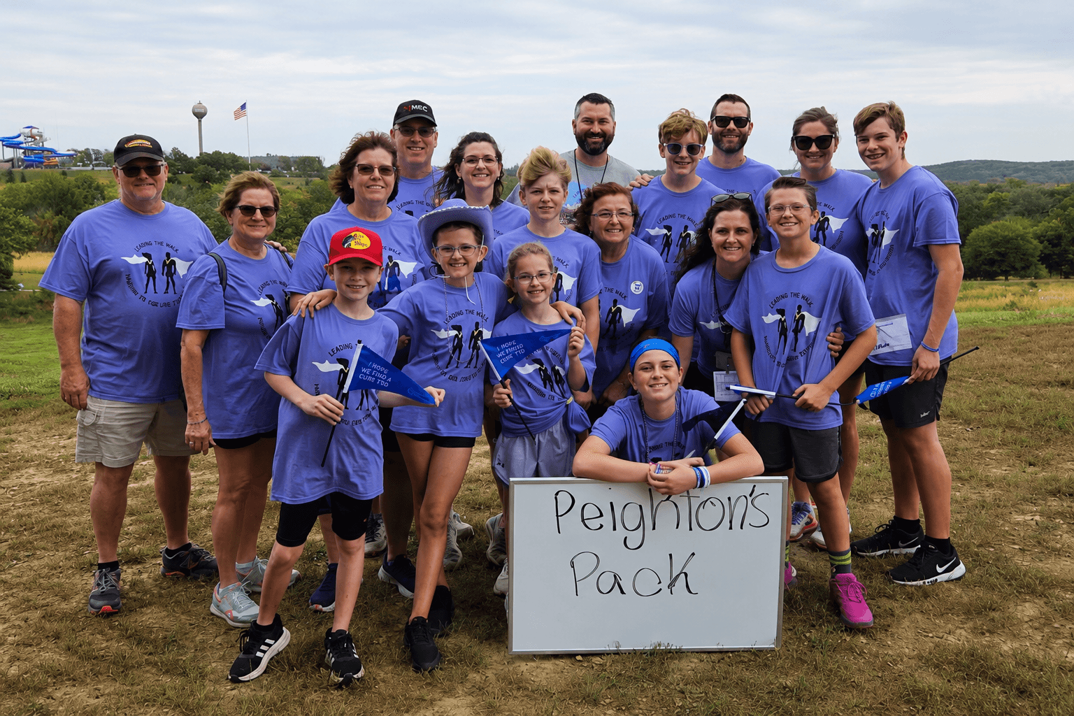 Peighton's Pack, the ECS family walk team, posing together at a Breakthrough T1D walk event